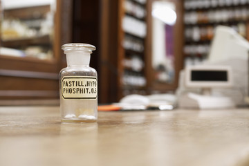 A glass bottle with pastilles