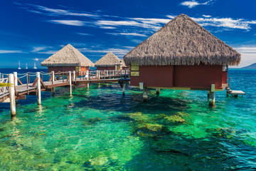 Overwater bungalows with best beach for snorkeling, Tahiti, Polynesia