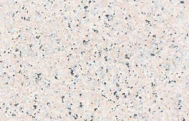 Real granite stone texture in top view. Natural material with beige abstract texture pattern of mineral, quartz. Smooth surface for decorative wall, floor, countertop, slab in bathroom and kitchen.