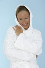 Young woman wearing a bathrobe