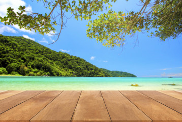 Wood table and blue sky with seascape background