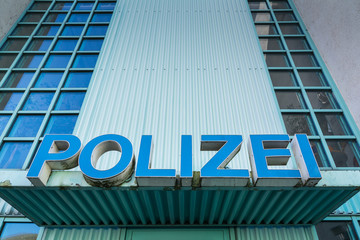 Polizei Police Sign Station Front Entrance Authority Blue Shield Title Large Letters Doors Closeup