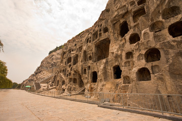 Buddhist Carvings at Caves of Longmen Grottoes in Luoyang, China