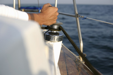 Obraz premium Man using winch