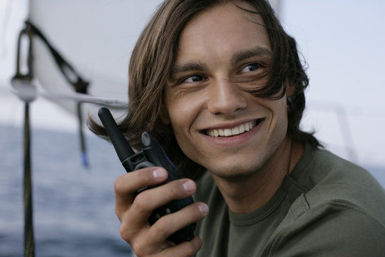 Man holding a walkie-talkie in his hands