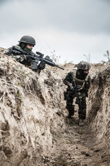 Paratroopers of french 1st Marine Infantry Parachute Regiment RPIMA in entrenchments