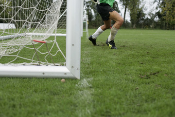 Goalkeeper in front of a goal