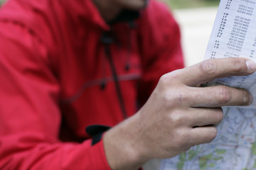 Mountaineer reading a map