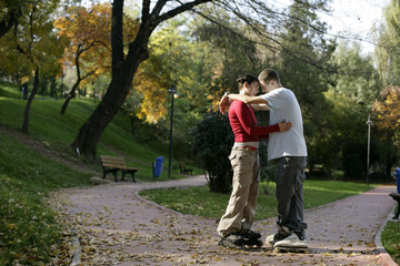 Fototapeta premium Teenage couple embracing