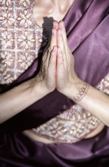 Dark-haired Woman in a Sari has her Hands folded - Tradition - Supplication