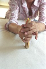 Woman holding Jackstraws (Detail)