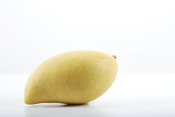 Yellow mango on white background