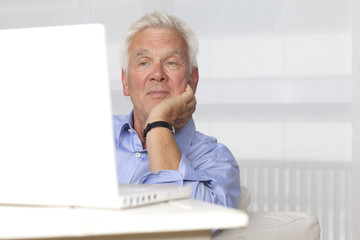 Fototapeta premium Senior man using laptop