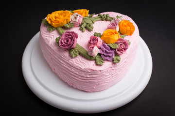 Delicious creamy cake with flowers