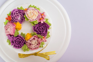Delicious creamy cake with flowers