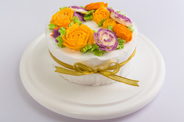 Delicious creamy cake with flowers