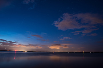 Blue and Orange Sky Sunset over Florida lake 