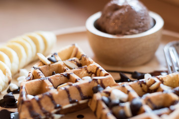 delicious sweet dessert : homemade waffle with chocolate sauce ,selective focus