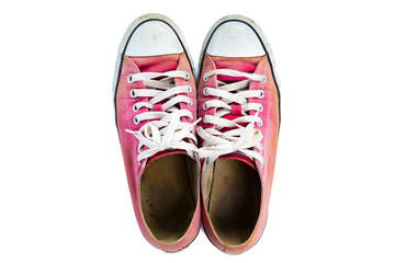 Top view of The old red sneakers with clipping path, isolated on a white background