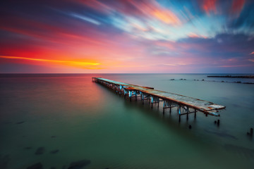 Old broken bridge in the sea, long exposure