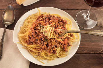 Plate of pasta with meat and tomato sauce