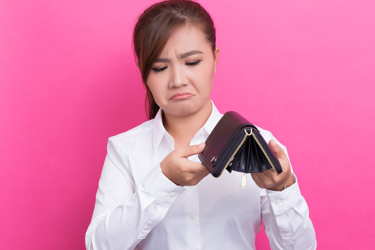 Poor woman with empty wallet