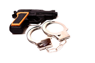 Hand lock up and gun on white background