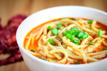 Hot and spicy curry noodle on the table
