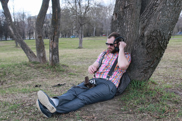 beard man relax tree