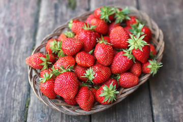 Strawberry on rustic wooden background