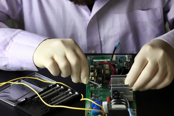 chip soldering man hands