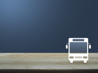 Bus flat icon on wooden table over light blue gradient background, Business transportation service concept