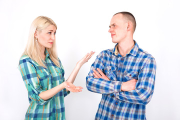 Young man and woman are arguing in the studio.