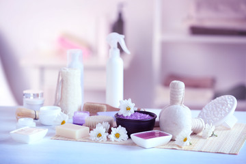 Obraz na płótnie Canvas Spa treatments on white table in salon
