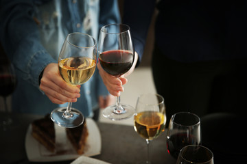 People with wine at party, closeup