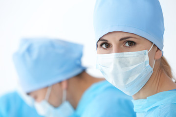 Portrait of beautiful young doctor in clinic