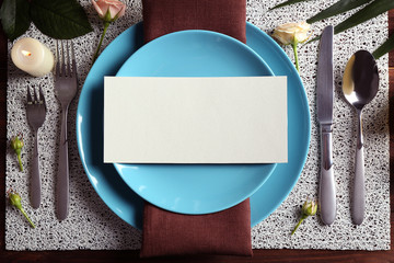 Beautiful festive table setting on wooden table