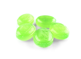 Cough drops on white background
