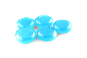 Cough drops on white background