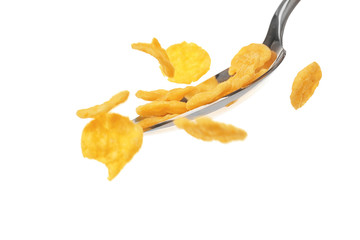 Fototapeta premium Spoon with cornflakes isolated on white