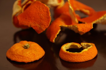 Mandarin crust is dried and isolated on a monophonic background. Zedra on the background