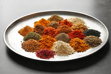 Different spices on tray
