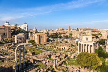 Rome, Italy. Ruins of the Roman Forum: Arch of Septimius Severus, Temple of Castor and Pollux, Curia of Julius, Temple of  Deified Julius, Temple of Vesta, Temple of Antoninus and Faustina