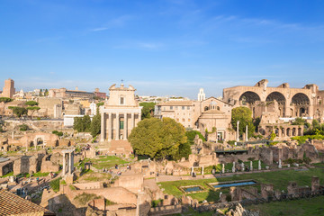 Naklejka premium Rome, Italy. Ruins of Roman Forum: Temple of Deified Julius, Temple of Vesta, House of Vestals, Temple of Antoninus and Faustina, Temple of Romulus, Basilica of Maxentius