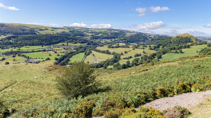 Fototapeta na wymiar Denbigshire landscape with Llangollen and Castell Dinas Bran seen from the Panorama Walk, Denbighshire, Wales, UK