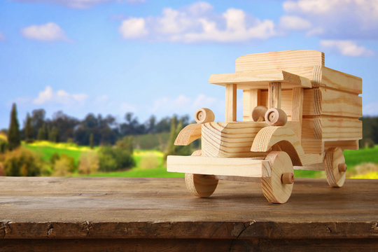 old wooden toy truck car over wooden table