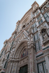 Fototapeta premium Florence cathedral entrance with detailed ornaments and white and green marble facade