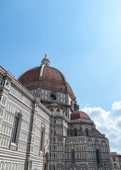 Fototapeta premium Florence cathedral with iconic duomo and white and green marble facade