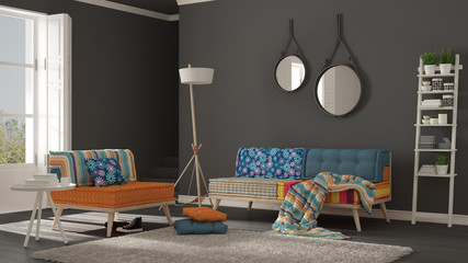 Scandinavian living room with colorful couch, armchair and soft fur rug, minimalist gray  interior design