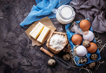 Fototapeta na wymiar Ingredients for baking. Milk, butter, eggs, flour